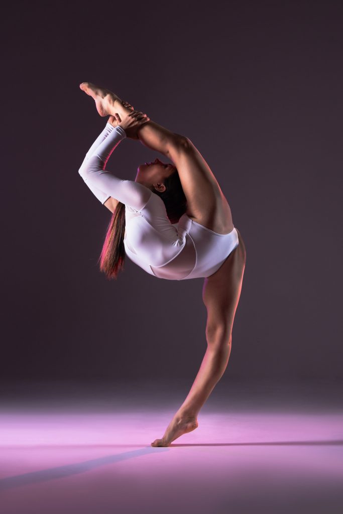 Photo of dancer & contortionist doing a needle pose