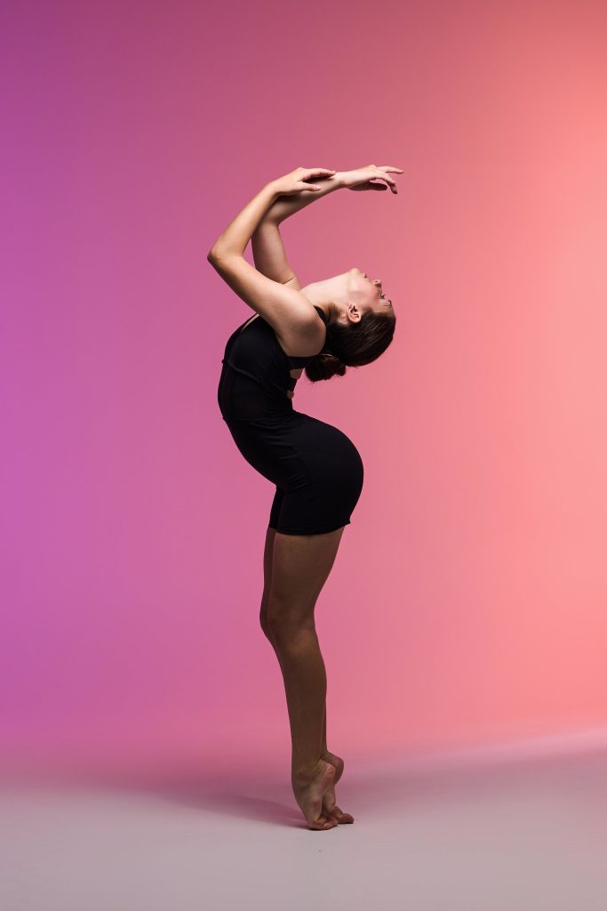 Photo of a dancer on her toes doing a backbend
